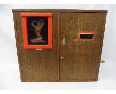 A scratch built peep show machine, built in the style of those made in the 1950s, with an R.B.Turner lamp inside.