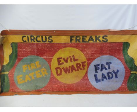 A large scale original artwork fairground banner on canvas, worded 'Circus Freaks', 75 x 32".
