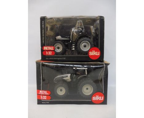 Two Siku 1/32 scale heavy tractor models: Valtra T191 and the Deutz-Fahr Agrotron.
