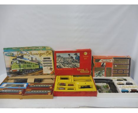 Three assorted train sets by Lima, Tri-ang and GMR, all untested and unchecked. 