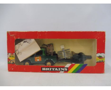 A Britains boxed Army Land Rover and gun with instructions, catalogue no. 9787.