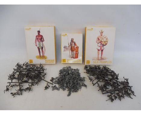 Three 1/72 scale boxed Hat soldiers to include Roman Legionairies, Sea Peoples and Nubin Infantry. 
