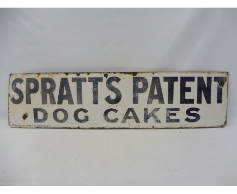 A Spratt's Patent Dog Cakes rectangular enamel sign, dated April 1935, 47 x 12".