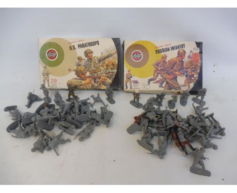 Two Airfix 1/32 scale boxed sets: the US Paratroopers and the Russian Infantry, correct number of soldiers and poses. 