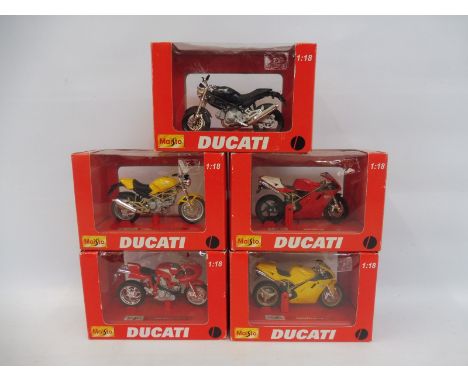 Five Maisto Ducatti motorcycles 1/18 scale, boxed. 