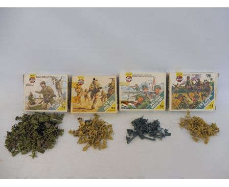 Four circa 1970s Airfix HO/OO plastic soliders, boxed to include WWII British Commandos, WWII British 8th Army, WWII German M