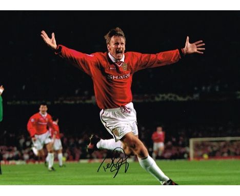 Teddy Sheringham Man Uts 1999 signed 16 x 12 inch photo. Good condition. All signed items come with a Certificate of Authenti