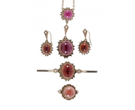 A GARNET AND ROSE DIAMOND DEMI PARURE, C1900 the garnets en cabochon mounted in gold, comprising ring, brooch, earrings and n