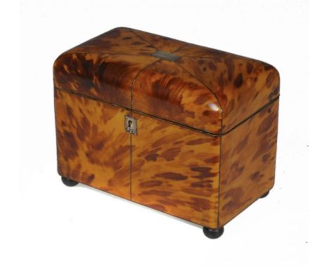 AN EARLY VICTORIAN TORTOISESHELL TEA CADDY, C1840  veneered in blond shell with wire stringing, the tablet to the lid engrave