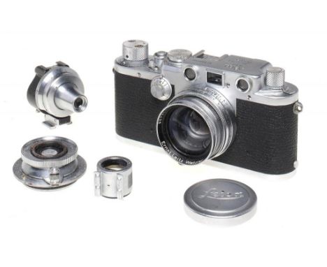 A LEICA IIIf CAMERA , NO 608750 with Leitz f Summitar f2.5cm and Elmar f3.5 3.5cm lenses, lens cap and two viewfinders      +