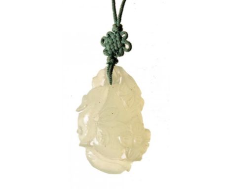 A CHINESE CELADON JADE PEBBLE CARVING, 20TH C  of a bud and flowers, 4.8cm h ++In good condition on silk cord