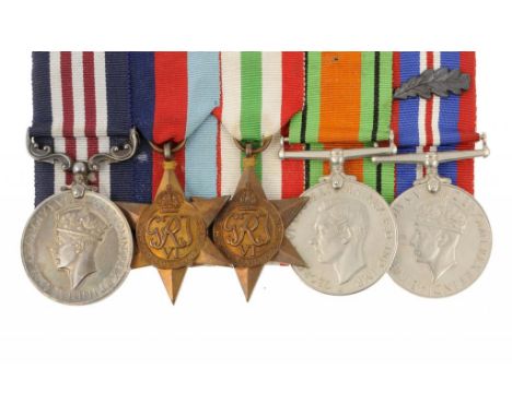 WORLD WAR TWO MM GROUP OF FIVE Military Medal, 1939-1945 Star, Italy Star, Defence Medal and War Medal with 'mention' emblem 