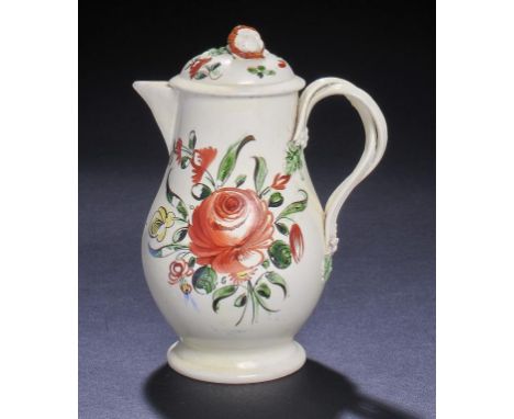A CREAMWARE JUG AND COVER, STAFFORDSHIRE OR YORKSHIRE, C1780 freely painted with a rose and other flowers, 14cm h ++Jug with 