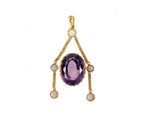 AN AMETHYST AND OPAL PENDANT, C1900  in gold ++Lacking tiny opal from suspension loop, otherwise in good condition.  Gross we