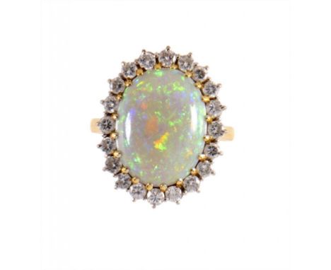 AN OPAL AND DIAMOND CLUSTER RING in 18ct gold, Birmingham 1988, size O ++In good second hand condition, gross weight 7.5g