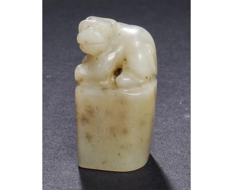 A CHINESE JADE SEAL, 19TH C carved with a crouching lion on an uncarved block, 4.3cm h ++In good condition 