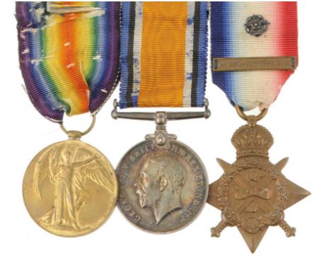 WORLD WAR ONE GROUP OF THREE  1914 Star with 5th Aug - 22nd Nov  1914 clasp and silver rosette, British War Medal and Victory