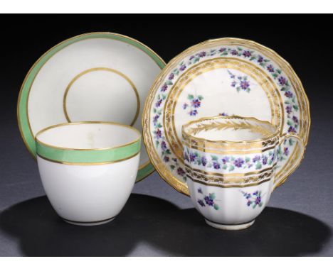 A DERBY HANDLELESS TEACUP AND SAUCER AND A FLUTED COFFEE CUP AND SAUCER, C1795-1800  the latter enamelled with French sprigs,
