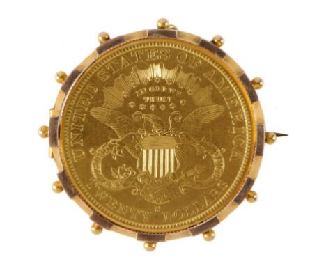 A GOLD COIN BROOCH  the knurled mount framing a contemporary USA 20 dollars, 1884