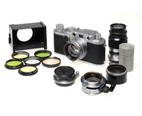 A LEICA IIIf CAMERA,  NO 652393  with Leitz Summitar f2 5cm, Elmar f3.5 3.5cm and Elmar f4 9cm lenses and various Leitz acces