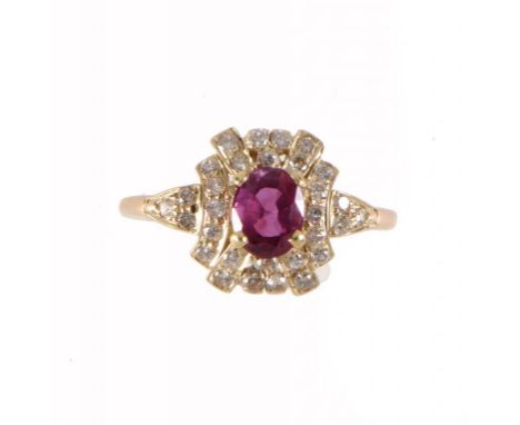 A RUBY AND DIAMOND CLUSTER RING with diamond shoulders, in gold, size L ++In very good second hand condition, the ruby clean 