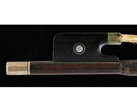 A VIOLIN BOW stamped CUNIOT-HURY, the round stick of red-brown colour,  nickel and ebony mounts, 58g ++Signs of use but in go