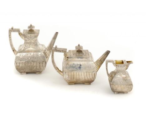 A VICTORIAN SILVER 'WILLOW PATTERN' ENGRAVED TEA AND COFFEE SERVICE  both pots with integral hinge, coffee pot 18cm h, by J, 