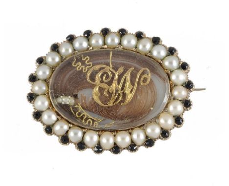 A VICTORIAN GOLD, SPLIT PEARL AND JET MOURNING BROOCH, DATED 1844 applied with the gold initials MB over hair, the back engra