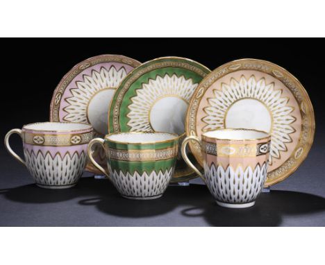 TWO DERBY TEACUPS AND SAUCERS AND A COFFEE CUP AND SAUCER, C1795-1800  in similar gilt patterns with green, 'Bloom' or salmon
