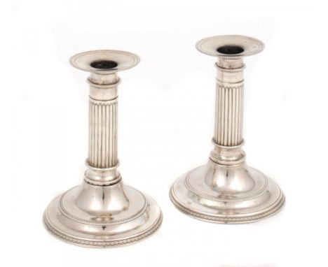 A PAIR OF SPANISH SILVER CANDLESTICKS  with reeded pillar, nozzles, 14.5cm h, by Antonio Ruiz, assaymaster Ximenez, Cordoba 1