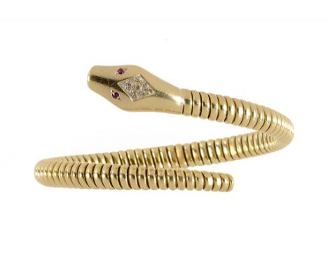 A DIAMOND SET GOLD SERPENT BRACELET, 20TH C  the reptile with ruby eyes, marked 750 ++In fine condition, weight 58.5g