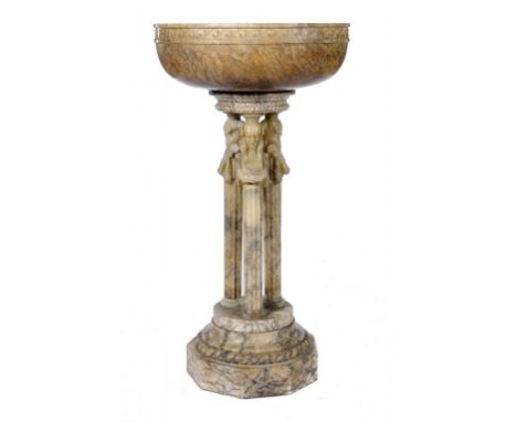 A MONUMENTAL ITALIAN ALABASTER JARDINIERE, C1930  the deep basin carved with vitruvian scrolls, on three herms and octagonal 