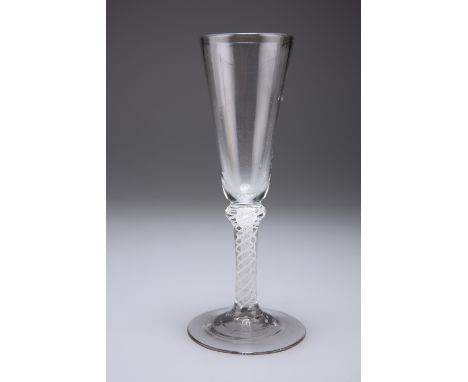 A LARGE ALE GLASS, LATE 18TH CENTURY, the tapering conical bowl raised on a triple opaque twist stem with central lace column