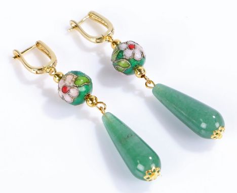 Pair of jade earrings with foliate enamel decorated orb centres and gilt paste set clasps