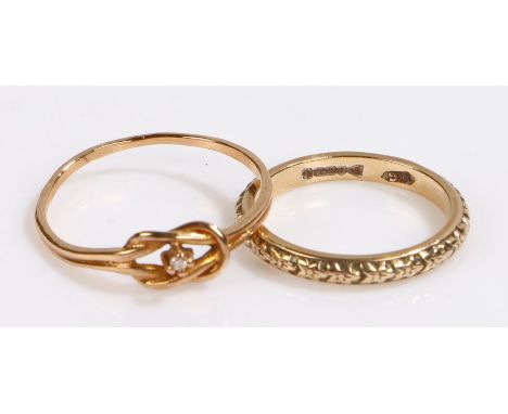 9 carat gold ring formed from two interlinked loops set with a single diamond chip, ring size R, 9 carat gold ringwith stylis