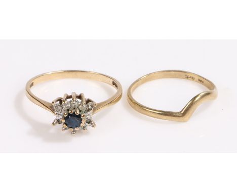 9 carat gold ring set with a central sapphire surrounded by diamond chips, ring size P, 9 carat gold ring with curved shank, 