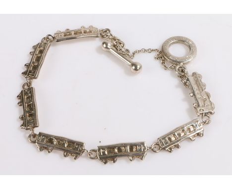 Silver Orient Express souvenir bracelet, each link in the form of a carriage and engine, 18.9g