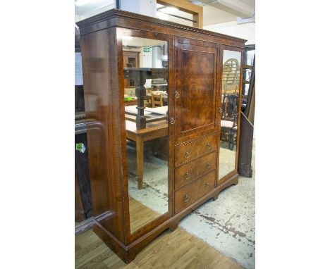 DRUCE &amp; CO. WARDROBE, 185cm H x 183cm W x 54cm D, early 20th century burr walnut, with two mirrored doors enclosing hangi
