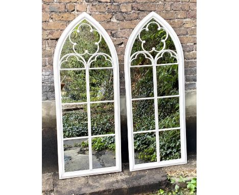 ARCHITECTURAL GARDEN MIRRORS, a pair, Gothic style painted metal frames with overlaid detail, 154x60. 