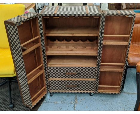 TRUNK STYLE DRINKS CABINET, 61cm x 46cm x 108cm H, on castors, in damier style finish. 