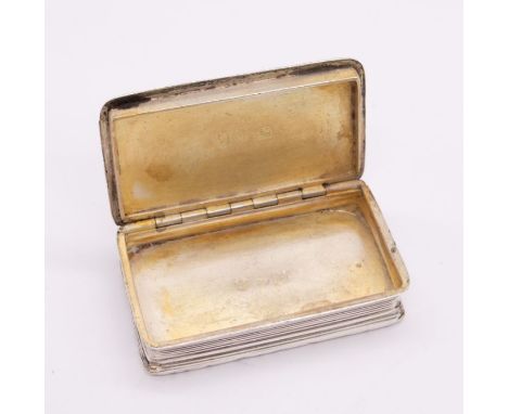 A George IV silver snuff box, raised border, striped engraved decoration, central vacant cartouche, hallmarked by TS., Birmin