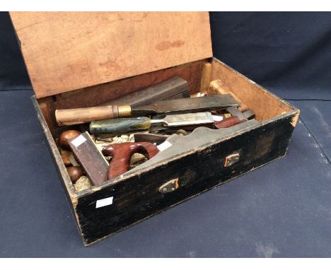 A 20th century wooden case with various tools inside to include; planes, rules, chisel, screwdrivers, set squares and others.