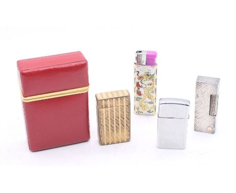 Dunhill- a white metal lighter with cross hatch engraved decoration, length approx 62mm, along with a Zippo and Dupont vintag