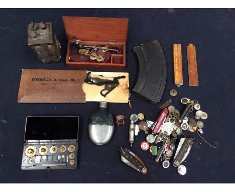 Collection of vintage pin and lapel badges, pen knives, vintage boxed scales, flask, gas goggles, glass, battery gun clip etc