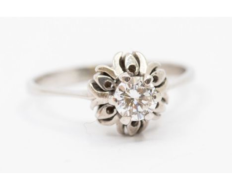 A diamond and white gold ring, comprising a central round brilliant cut diamond, weighing approx 0.40ct, claw set in a high m