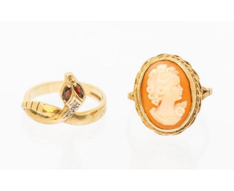 A 9ct gold mounted cameo ring, setting approx 18 x 14mm, size Q, along with a 9ct gold serpent ring with garnet set eyes, dia