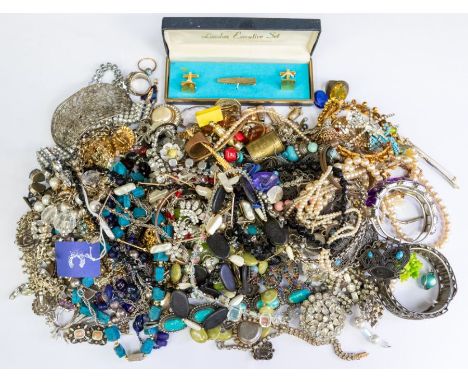 A collection of vintage costume jewellery to include paste set necklaces, brooches, earrings, white metal bangle, metal stone