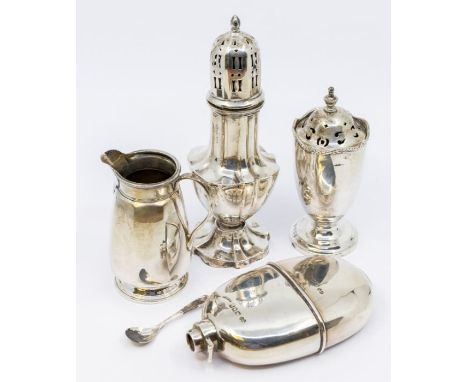 A group of silver to include: a George V caster, flared body, pierced cover, hallmarked Birmingham, 1911 (AF - foot almost de
