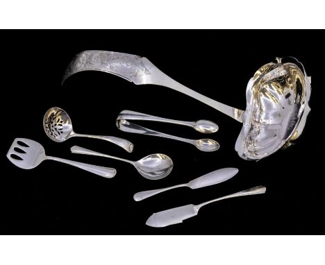 A 19th Century Dutch .833 silver large ladle, stylised elongated fiddle pattern engraved with foliage, the shaped oblong curv
