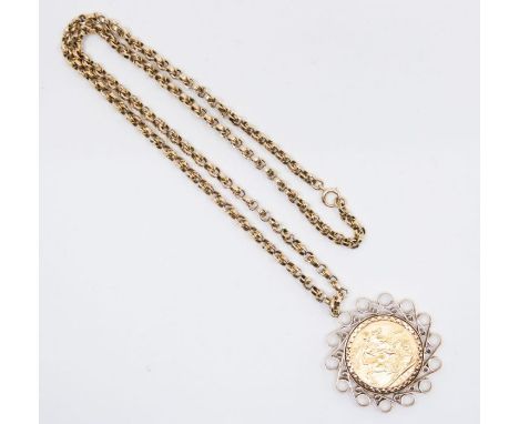 A George V sovereign dated 1910 in a 9ct gold mount on a "9c" stamped chain. Total approximate weight 22.2 grams.